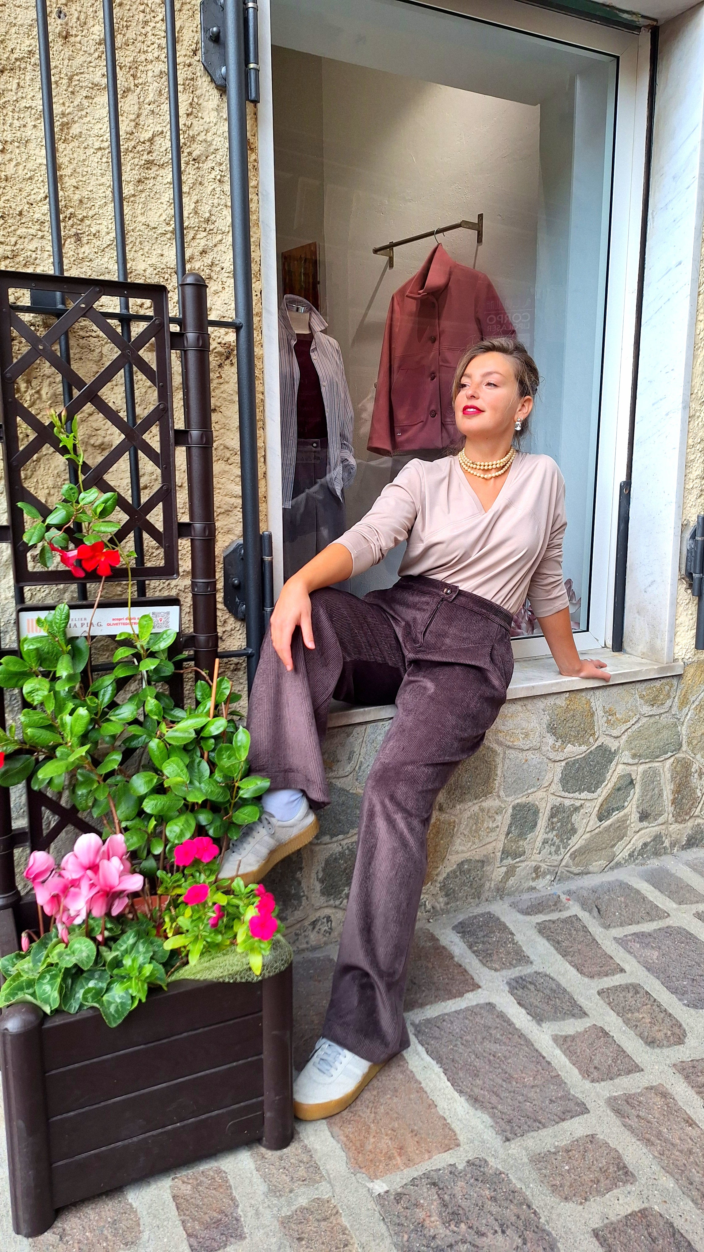 Pantalone palazzo con piega