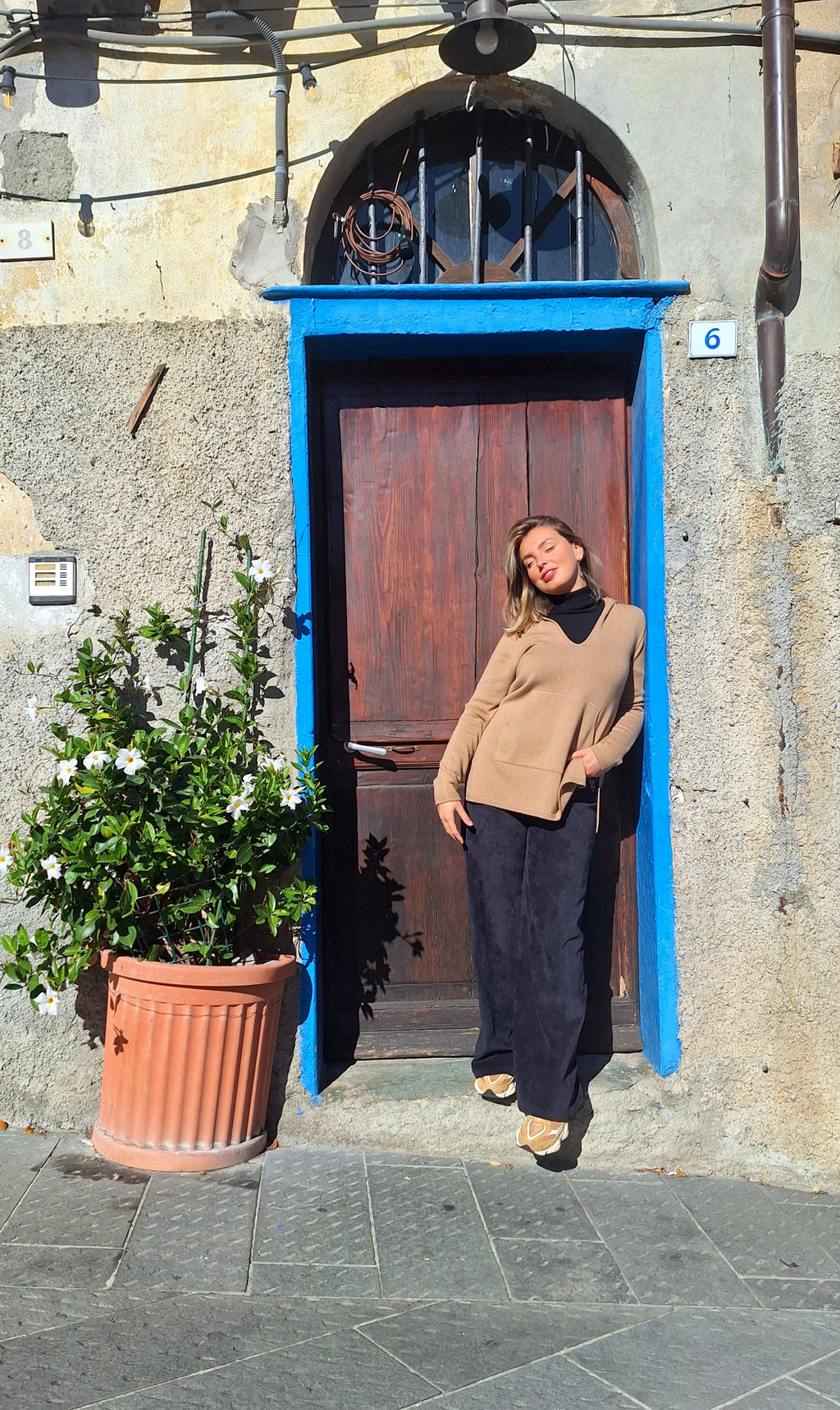 Maglia con cappuccio 100% pura lana