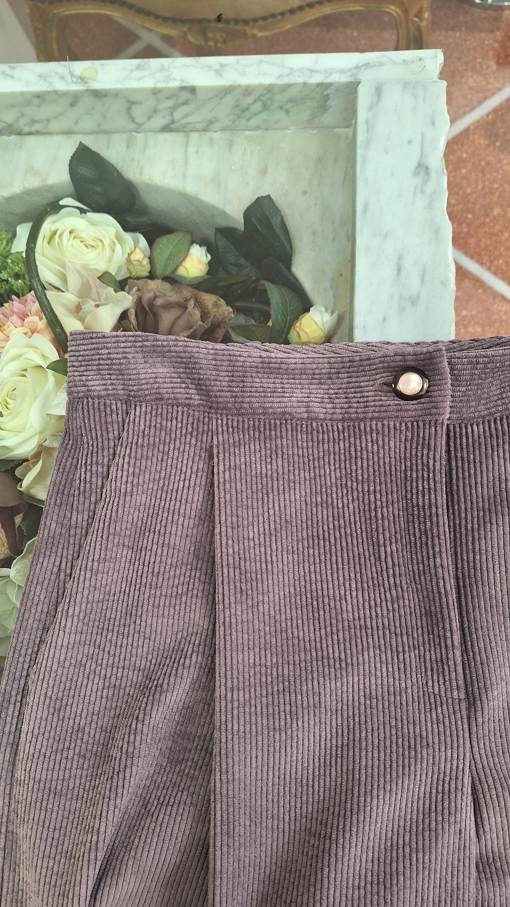 Pantalone palazzo con piega