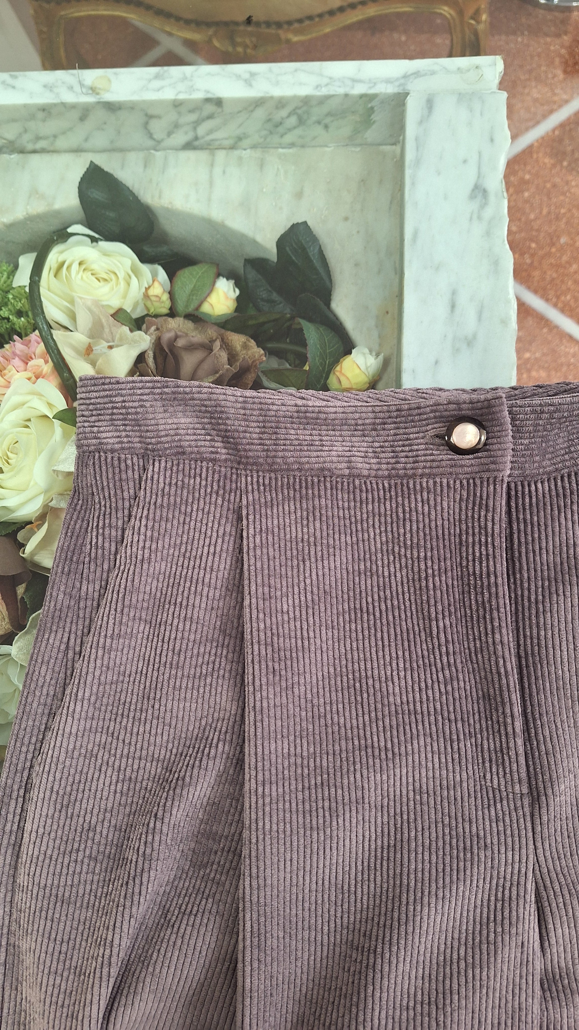Pantalone palazzo con piega