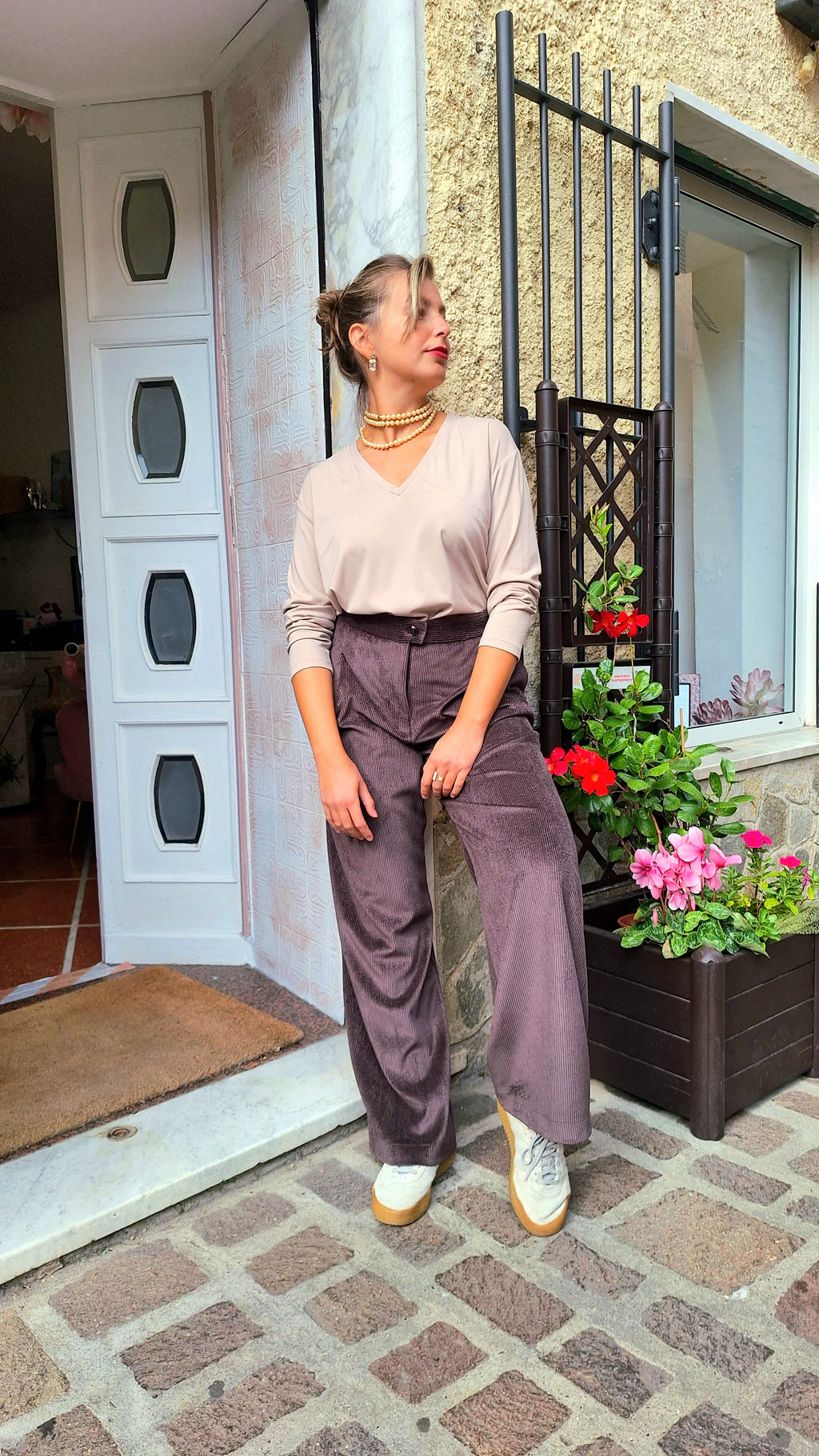 Pantalone palazzo con piega