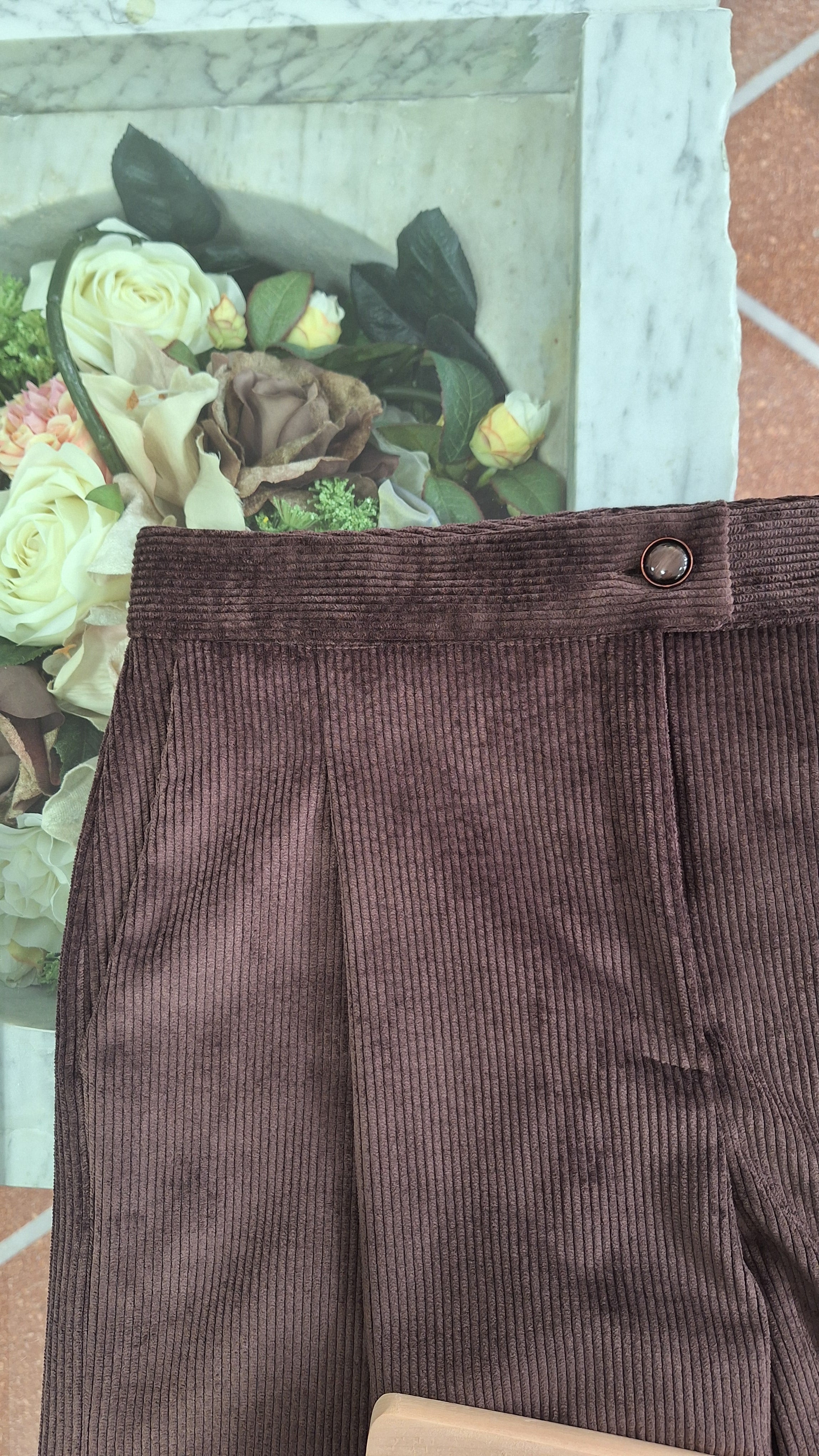 Pantalone palazzo con piega